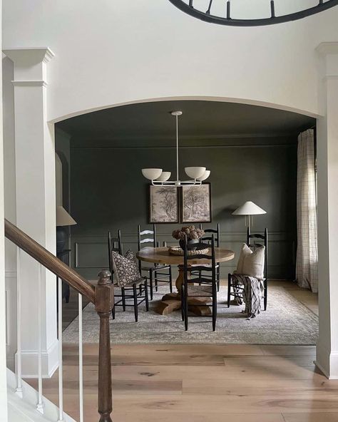 32 Elegant Dark Green Walls for a Modern Aesthetic Green Dining Room Walls, Black And White Dining Room, Round Wooden Table, Picture Frame Wainscoting, Neutral Dining Room, Dining Room Wainscoting, White Wainscoting, Green Accent Walls, Green Dining Room