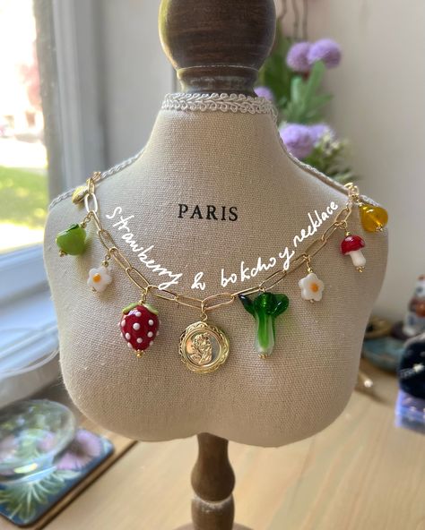 The perfect playful charm for every mood! 🫖🌸🥬🍄 Embrace your inner child with our iconic charm jewelry. ✨ 20% off sitewide | code: TREATS 📦 We ship worldwide @ €3.95 (EU) / $6 (US/AU) / £5 (UK) 💌 Shop cute jewelry & thoughtful gifts at Gabi-label.com today! Gabi The Label, Red Strawberry, Locket Charms, Ceramic Teapots, Creative Jewelry, Summer Accessories, Cute Jewelry, Jewelry Branding, Glass Pendants