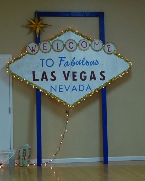 Vegas sign made from cardboard and paper plates for our fund raiser. Vegas Theme Prom Ideas, Vegas Themed Christmas Party, Las Vegas Dance Theme, Diy Las Vegas Decorations, Diy Las Vegas Sign, Diy Vegas Sign, Old Vegas Theme Party, Las Vegas Party Ideas, Las Vegas Decorations Ideas