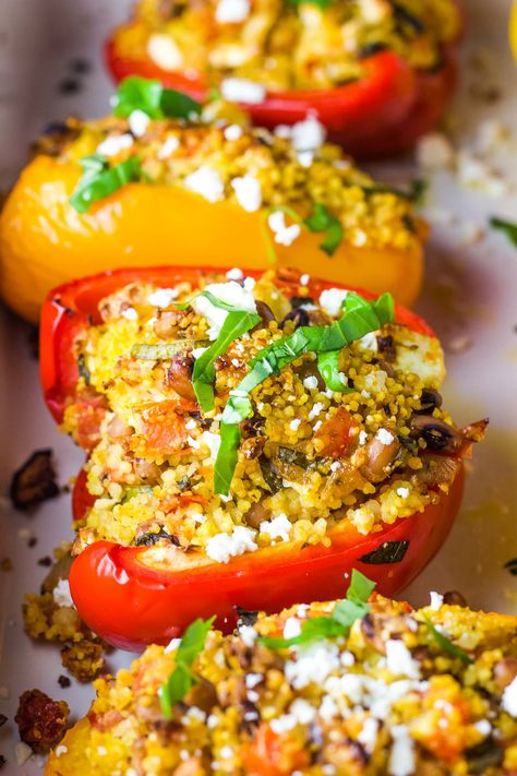 Vegetarian Mediterranean stuffed peppers with couscous are easy to make, healthy, and packed with fresh Greek flavors. Perfect as a main or side, they are as nutritious as they are delicious. Winter Mediterranean Recipes, Vegetarian Entrees Main Dishes, Stuffed Peppers With Couscous, Stuffed Paprika, Vegan Mediterranean Recipes, Couscous Stuffed Peppers, Mediterranean Stuffed Peppers, Couscous Dinner, Vege Dishes