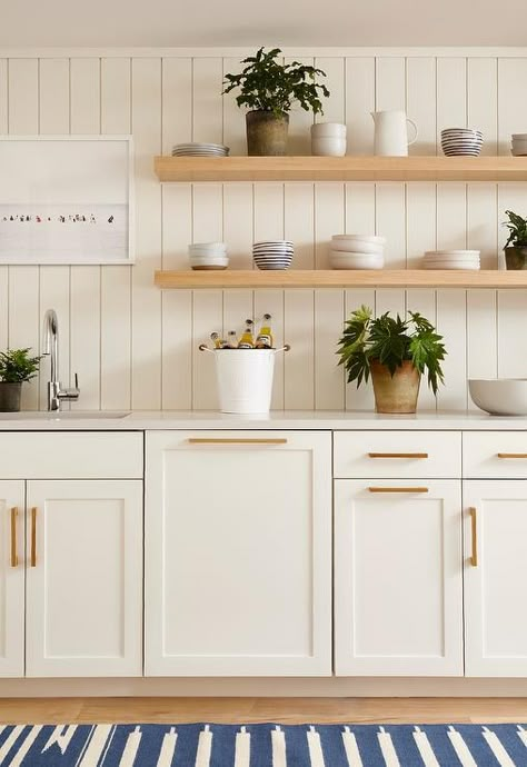 Vertical Wood Backsplash Kitchen, Verticle Shiplap Backsplash Kitchen, Shiplap Above Cabinets, Shiplap Wet Bar, Modern Shiplap Kitchen, Vertical Paneling Backsplash, White Cabinets Wood Shelves, Small White Coastal Kitchen Ideas, White Kitchen Shiplap Backsplash