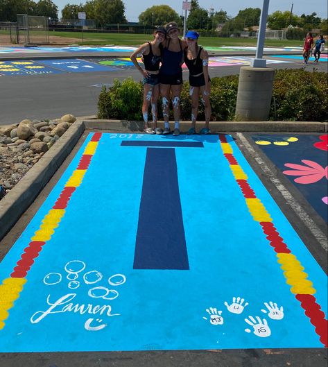 Swimmer Painting Ideas, Senior Box Ideas Painted, Parking Spaces Ideas, Senior Parking Spaces Funny, Highschool Parking Spot Ideas, Painted Parking Spaces Ideas, Senior Spots, Unique Senior Parking Spot Ideas, National Signing Day