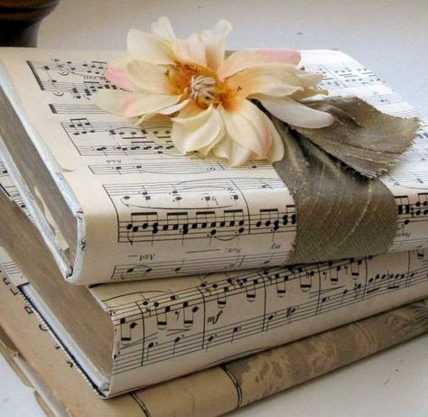 Vintage Music Sheets Decor, Book Repurpose, Hymnal Crafts, Music Table, Craft Paper Wrapping, Sheet Music Crafts, Stamped Books, Old Book Crafts, Sheet Music Art