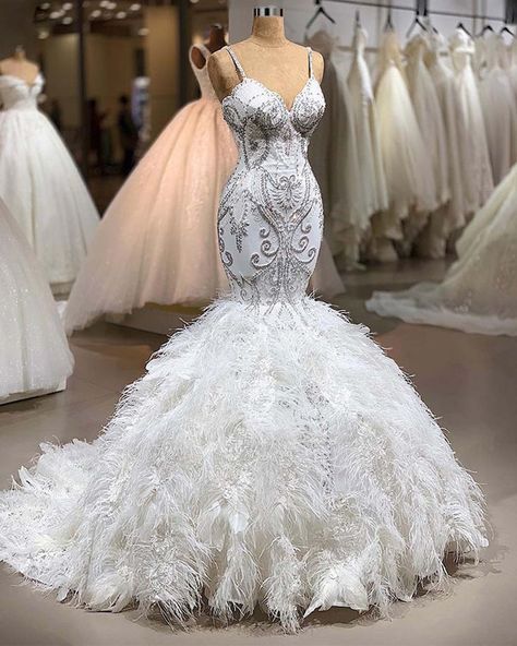 This is an exquisite mermaid/trumpet wedding dress that features nice workmanship of embroidery and feather decorations, with sweep train. Epic Dresses, Bridal Gowns Plus Size, Wedding Dresses Spaghetti Strap, Gowns Plus Size, Beaded Mermaid, Marriage Dress, Bling Wedding Dress, Boda Mexicana, Mermaid Wedding Dresses