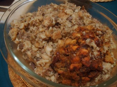 In my photo you will notice a darker portion of the stuffing; this was the bit that was stuffed into the turkey itself and after roasting it has a crispy outside coating. This is a delicious savoury stuffing that I make every year for Thanksgiving. During the year I love to make it with a whole chicken minus the giblets as I cant find chickens that come with giblets in the UK. Its fantastic and whatever doesnt fit in the bird you can bake on the side. Note: I sometimes like to use a mixture o... Turkey Giblet Stuffing, Giblet Stuffing, Stuffing For Turkey, Crock Pot Stuffing, Homemade Stuffing Recipe, Turkey Giblet Gravy, Moist Stuffing, Homemade Stuffing Recipes, Recipe For Turkey