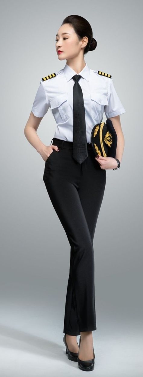 Female Pilot Uniform Pilot Outfit, Air Hostess Uniform, Hunger Games Fashion, Pilot Costume, Pilot Uniform, Flight Girls, Women Wearing Ties, Flight Attendant Fashion, Female Pilot