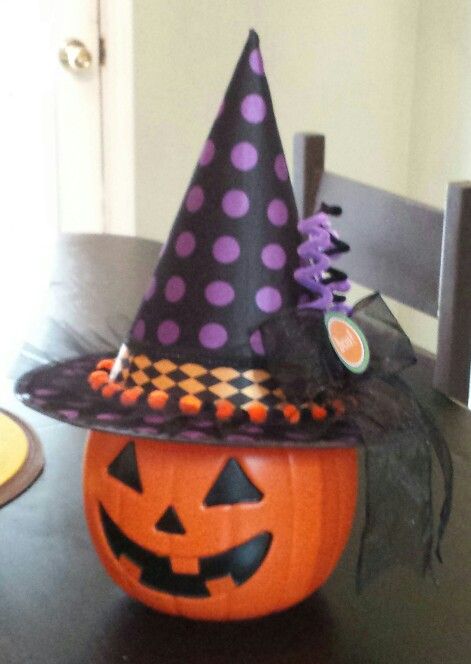 Dollar tree witch hat decorated on plastic pumpkin. September 2014. Dollar Tree Witch Hat, Halloween Dollar Tree, Pumpkin With Witch Hat, Holiday Classroom, Plastic Pumpkins, Witch Hats, Halloween Goodies, Pumpkin Halloween Decorations, Halloween 2020