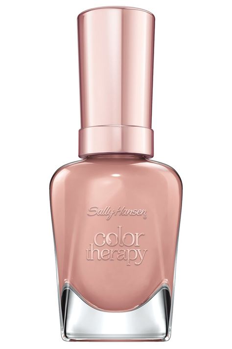 We'll never get tired of the prettiest neutral of all: rose gold. The drugstore polish looks positively charming and works on a budget. #nailpolish #nailideas #valentinesdaynails #nailcolors2021 #southernliving Nail Polish Sally Hansen, Sally Hansen Color Therapy, Sally Hansen Nail Polish, Pretty Nail Colors, Fun Nail Colors, Sally Hansen Nails, February Nails, New Nail Polish, Olive And June