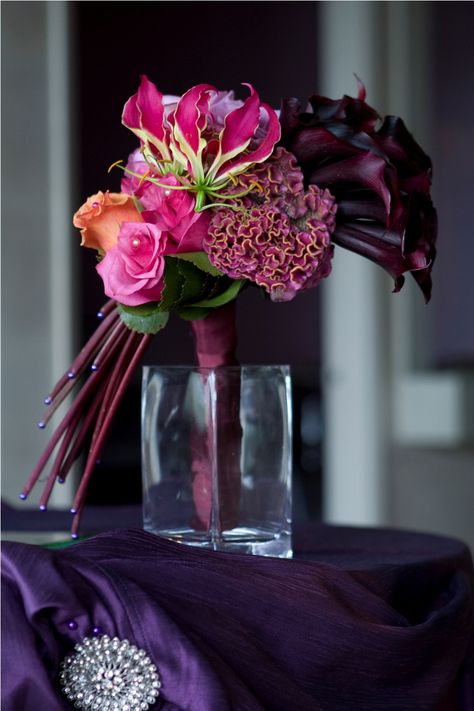 Contemporary bridal bouquet with Gloriosa lily and the purple tones with fresh green, celosia - LOVE, LOVE, LOVE :)) Celosia Bouquet, Contemporary Bouquet, Gloriosa Lily, Contemporary Flower Arrangements, Bouquet Bride, Contemporary Bridal, Corporate Flowers, Flowers Color, Purple Tones