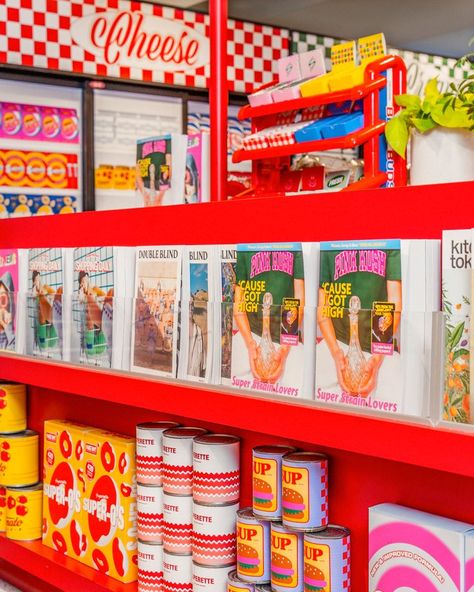 Superette's retro bodegas are stylishly avant garde. Bursting with bright colors and kitschy decor, the chain's designers drew inspiration from familiar spaces (minimarts and neighborhood delis, for example) to create destinations that are at once outlandish, comforting, and rebelliously imaginative. #cannabisindustry #retaildesign #interiordesign #retail #superette #dispensarydesign 70s Grocery Store, Retro Grocery Store Aesthetic, Vintage Grocery Store Aesthetic, Super Market Aesthetic, Bodega Aesthetic, Bodega Design, Retro Grocery Store, Retro Grocery, Emily Robinson