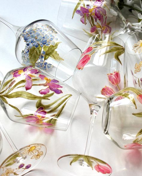 Behind the scenes on how I photograph my glassware and artwork. Nothing fancy necessary 🌱 📸 Pictured is my newest, hand painted glassware collection. This beautiful collection will debut in- person at @canavineyards Budbreak Festival on Saturday, April 27th and then in my online shop on Monday, April 29th. Just in time for Mother’s Day shopping 💕 #jennymothersheadart #glasspainting #pebeopaints #behindthescenes #flowers #artforthehome #marylandartist #frederickartist #artistmother #spri... Painted Glassware, Hand Painted Glassware, Painting Glassware, Champagne Bottles, Glassware Collection, Just In Time, Glass Painting, Wine Tasting, Garden Party