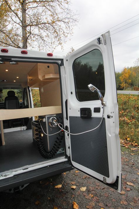 Outdoor shower setup on "Baja"! Check out more photos of this build on the project gallery of our website. #van #vanlife #shower #outdoorshower #vanshower #promaster #dodgepromaster #promastervan #vanconversion #convertedvan #freedomvans Van Camping Ideas, Combi Vw T2, Ford Van Conversion, Surfboard Storage, Diy Van Conversions, Camper Van Life, Sprinter Van Conversion, Van Conversion Interior, Bed Platform