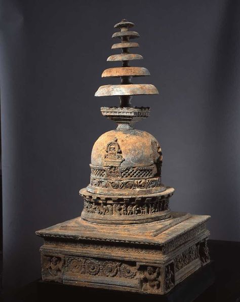 A Schist model of a Stupa Gandhara, 2nd/3rd century  Height: 86.5 cm, 34.1 inches  Dimensions of base: 44.5 cm x 44.5 cm, 17.5 inches x 17.5 inches  This magnificent model is formed in grey schist and still bears traces of gilt decoration. The form of the stupa - a sacred monument containing relics, personal effects or built to commemorate an event of religious significance - originated in pre-Buddhist burial mounds. Culture Of Thailand, Stupa Buddha, Buddhist Stupa, Buddhist Statue, Ancient Buddha Sculpture, Ancient Kingdom, Islamic Caligraphy, Temple Architecture, Indian Sculpture