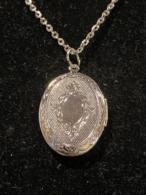 Necklace is silver in color Measures 18, 20 or 24 inches in length Pendant measures 1.5 inches in length and 1 inch in width Oval Locket Necklace, Locket Necklace Vintage, Oval Locket, Vintage Lockets, Gold Locket, Jewelry Lookbook, Jewelry Inspo, Dream Jewelry, Locket Necklace