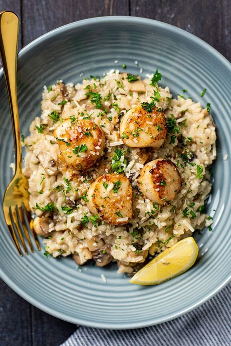 Simple pan seared lemon butter scallops served over my favorite risotto recipe made with shallots, garlic, Parmesan cheese, mushrooms and a little white wine. Savory and delicious. #seafoodrecipes #risotto #parmesanrisotto #scallops #mushroomrisotto Risotto Scallops Recipes, Scallops Over Risotto, Scallops And Mushroom Risotto, Seared Scallops And Risotto, Scallop Asparagus Risotto, Parmesan Risotto, Mushroom Risotto, Lemon Butter, Risotto Recipes