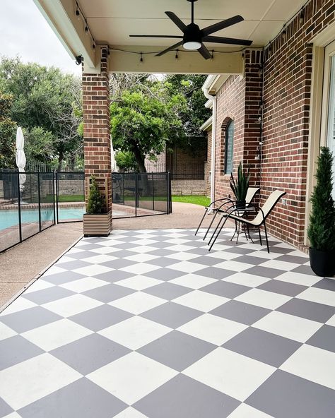 I painted my patio floor! I’ve been wanting to do this checkered pattern for a while but in between other projects and school activities it’s been a wild couple of months. When my stepdad offered to help me I took him up on his offer and we were able to do it in 2 days! While I love love the results I would not do it that fast again. 😂 I must have done 1000 squats in between drawing out the lines, taping and painting. I still have a few places where touch ups are needed but overall I’m so h... Painted Balcony Floor, Checkered Porch Floor, Painted Checkered Floor, Checkered Patio, Tile Patio Floor, Tile Patio, Outdoor Tile Patio, Paint Concrete Patio, Balcony Floor