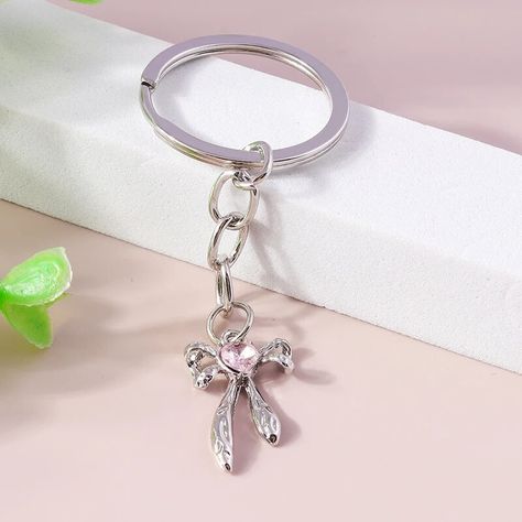 Accessorize with elegance using our Crystal Bowknot Heart Keychain! 🎀💖 Featuring charming crystals and a heart-shaped design, it adds a touch of glamour to your keys. Carry your keys in style! Shop now! Diy Jewelry Projects, Heart Keyring, Girls Handbags, Heart Keychain, Handbag Charms, Accessories Diy Jewelry, Travel Cosmetic Bags, Sparkling Crystal, Trendy Accessories