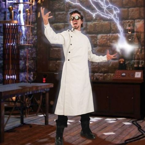 LET YOUR INNER MAD SCIENTIST OUT TO PLAY IN THIS AWESOME STEAMPUNK MAD SCIENTIST VICTORIAN LAB COAT! This lab coat was high-fashion for the mad scientists in Victorian times!  The steampunk elements are in the large black snaps running along the neck, shoulders, wrists and down the asymmetrical front panel.  Made of heavy white denim, this long-sleeved, full-length overcoat is durable as a lab coat should be expected.  The adjustable belt and buckle at the rear provide a comfortable fit. Mad Scientist Outfit, Mad Scientist Lab Coat, Steampunk Frankenstein, Scientist Lab Coat, Scientist Outfit, Lab Coat Costume, Film Writing, Mad Scientist Costume, Dr Horrible