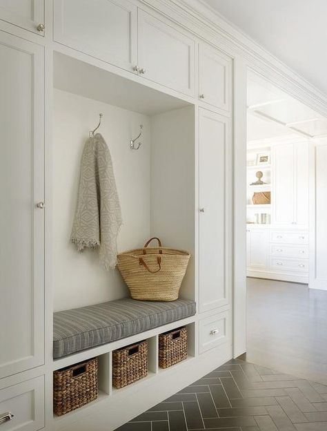 11 Decor Ideas to Make Narrow Hallways Look Bigger | Hunker Small Mudroom Ideas, Vstupná Hala, Farmhouse Mudroom, Herringbone Tile Floors, Mudroom Entryway, Mudroom Decor, White Shaker Cabinets, Mudroom Design, Herringbone Floor