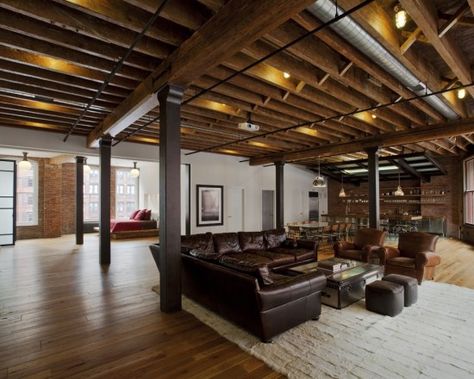 Basement w/unfinished ceiling, wood floor   I like the stained unfinished ceiling - Good idea for Rustic. Exposed Basement Ceiling, Industrial Basement, Traditional Family Room, Tribeca Loft, Basement Inspiration, Basement Plans, Diy Basement, Bar Designs, Basement House