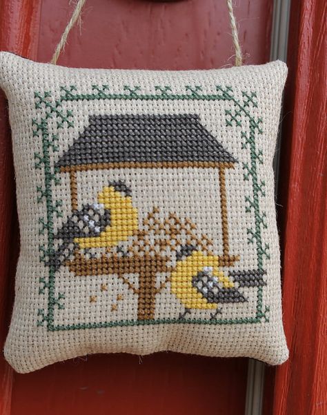 Cross Stitch Gold Finches on a Bird Feeder by Stitchcrafts on Etsy Ornament Door Hanger, Ornament Door, Unique Cross Stitch, Prairie Schooler, Cross Stitch Tutorial, Holiday Cross Stitch, Cross Stitch Love, Cross Stitch Supplies, Completed Cross Stitch