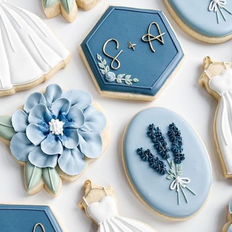 Leah Durso on Instagram: "All the blues and florals for this set 💙" Blue Floral Cookies Decorated, Blue And White Wedding Cookies, Dusty Blue Wedding Cookies, Wildflower Wedding Cookies, Hydrangea Cookies Decorated, Something Blue Before I Do Cookies, Blue Birthday Cookies, Blue Bridal Shower Cookies, Blue Wedding Cookies