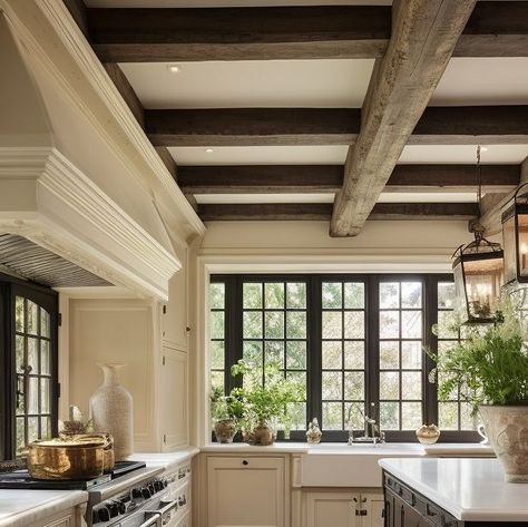 Sarah Robertson on Instagram: "How to make a white kitchen more layered?  Here’s a few examples from our Midjourney Mondays collection.  1) add dark windows and maybe some faux beams. 2). Add a rug…always a plus. 3). Add some pretty curtains and maybe pop the doors off those wall cabinets and show off what’s inside 4) Add a whole bunch of decorative accessories. Here’s your excuse to hit the local estate sales!!!   Our own kitchen is pretty white (it’s actually @benjaminmoore light pewter and it’s been forever since I’ve shown it on the gram) and I do use plants and fun estate sale finds to keep it personal.   ALL AI DESIGN BY US HERE @studiodearborn" Traditional Range Hood, Kitchen With Fireplace, Sarah Robertson, Tudor Homes, Breakfast Rooms, Dark Windows, Faux Beams, Butlers Pantry, Tudor House