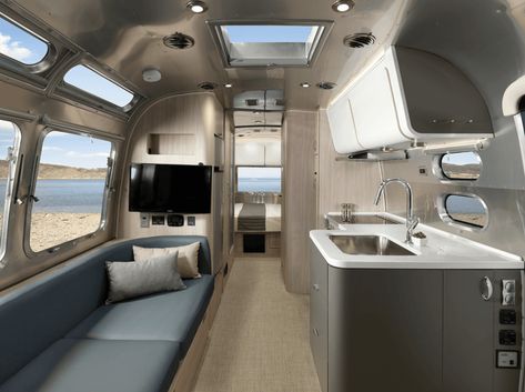 Introducing the all-new 25-foot Airstream Globetrotter | Airstream Airstream Globetrotter, Airstream Living, Grey Vinyl Flooring, Modern Restaurant Design, Airstream Trailers For Sale, Airstream Interior, Lobby Interior Design, Airstream Renovation, Airstream Trailers