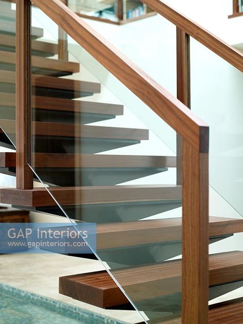 Detail of modern wooden and glass staircase Glass Guardrail, Staircase Glass Design, Wooden Staircase Railing, Glass Staircase Railing, Wooden Staircase Design, Glass Stair, Glass Railing Stairs, Staircase Railing Design, Staircase Design Modern