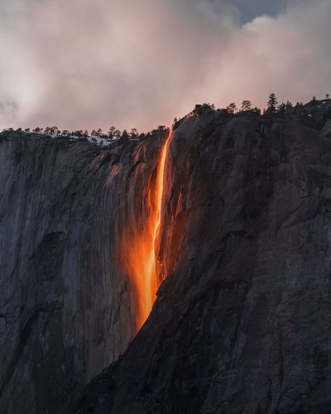 Firefall In Yosemite Valley,.Each February, the sunset hits the right angle over yosemite valley to light up horsetail falls, resulting in a spectacular effect looking something like a lava-flow. we were fortunate enough to see this event two years ago during a clear break in an otherwise rainy day. National Geographic Photo Contest, Horsetail Falls, National Geographic Photography, National Geographic Photographers, Yosemite Valley, Foto Art, Cool Pictures Of Nature, National Geographic Photos, Nature Photographs