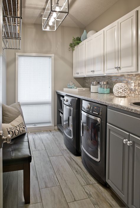 Long Narrow Laundry Room, lots of counter space. Wood look ceramic tile, gauntlet gray cabinets Narrow Laundry, Narrow Laundry Room, Laundry Room Tile, Vintage Laundry Room, Laundry Room Lighting, Room Storage Diy, Dream Laundry Room, Laundry Room Flooring, Laundry Room Layouts