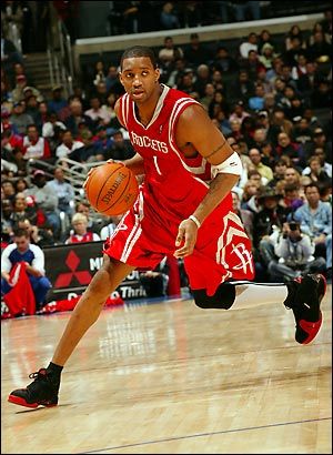 Tracy McGrady - Houston Rockets - NBA Tracy Mcgrady Rockets, Dancing Movement, Sports Athletes, Red Rising, Basketball Players Nba, Tracy Mcgrady, Hoop Dreams, Chris Paul, Nba Pictures