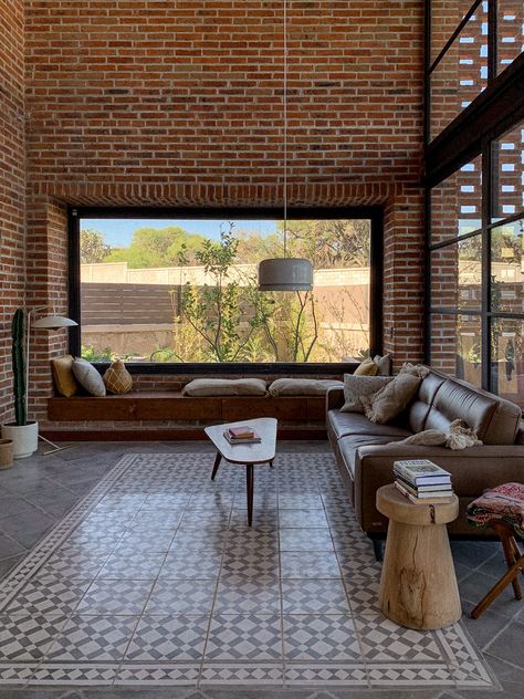 Casa Pereki is an "off the grid" house located in San Miguel de Allende, Mexico. Designed -and almost self-built- by the oners in 2016, was finally finished in 2022. Inspired in the several brick factory in the area, it shows a mixture of industrial architecture, with exposed materials: brick, concrete, iron, etc. but softened with simple shapes, straight lines, light & furniture made of wood, clay, stone and even plastic #interiors #interiorstyle #design #interiordesign #lounge #architecture Exposed Concrete Interior, Wood And Concrete Architecture, Lounge Architecture, Cement House, Brick Furniture, Brick Factory, Brick House Designs, Urban Rooms, Light Furniture