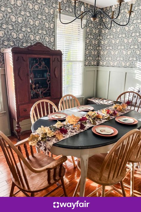 Give your dining room a rustic refresh (just in time for fall). Think: a two-toned dining table, spindle back wooden chairs, and a garden-inspired table runner. Christmas Dining Table Decor, Dining Table Height, Vintage Inspired Kitchen, White Linen Napkins, Christmas Dining Table, Dining Room Table Decor, Rustic Dining Room, Clear Glass Vases, Kitchen Inspiration Design