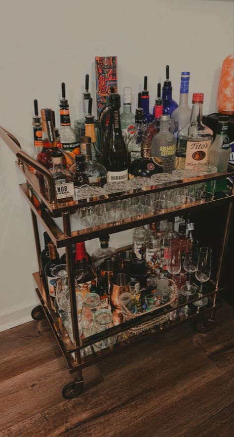 Drinks Trolley Aesthetic, Stocked Bar Cart, Drink Cart Aesthetic, Bar Cart For Men, Alcohol Cart Ideas, College Guy Apartment, Alcohol Room Decor, Bedroom Bar Cart, Alcohol Trolley