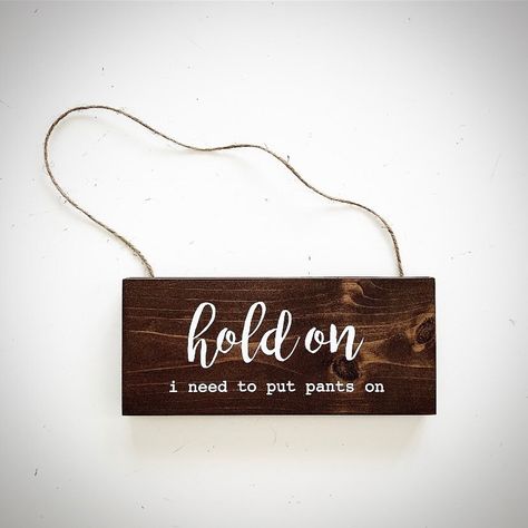 ~ Hold on i need to put pants on, Custom Wood Sign, No Soliciting Sign, Bedroom Door Sign, Funny Front Door, Welcome Sign  ~ Made to order and completely customizable. This piece is hand stained to achieve a rustic but clean wood finish. Each sign is handcrafted and has its own unique character. No two pieces are identical. For custom orders, please contact us PRIOR to checkout as pricing may vary.  ~ Painted (colored) and stained finishes are available and this may dictate a change in the color Dorm Door Signs, Door Sign Funny, Funny No Soliciting Sign, Front Door Welcome Sign, Door Welcome Sign, Dorm Door, Bedroom Door Sign, No Soliciting Sign, Clean Wood