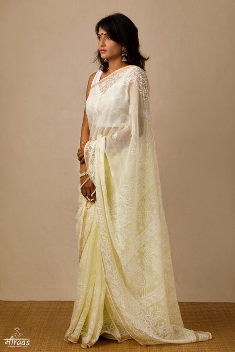 Tepchi Chikankari on Fluid Kota Doria is like a floating dream on a celestial river. This is the reason why we have finished this saree with crochet lace & sea shell details.The soft Lemon Yellow hue is soothing to the scorched summer soul, & the Kota is light & airy like a feather. The palla is Tepchi heavy & the border is heavier than usual, keeping the rest of the saree fluid with small bootas.#chikankarisaree #kotasaree #softkotasaree #tepchisaree #handloomsaree #summersaree Chikankari Sari, Soft Cotton Saree, Kota Doria Saree, Unique Sarees, Chikankari Saree, Kota Sarees, Saree Cotton, Yellow Saree, Embroidery Saree