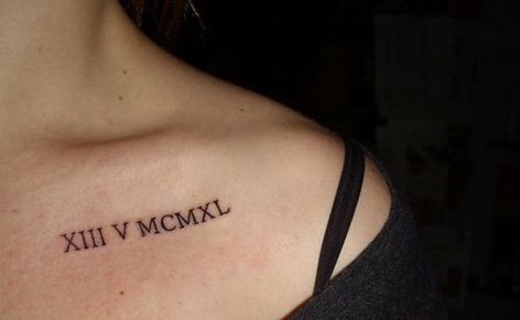 Text tattoos are a popular choice for the clavicle area. Roman Numbers Tattoo, Tattoo Fe, Font Tato, Quote Tattoos Placement, Wörter Tattoos, Roman Numeral Tattoos, Kunst Tattoos, Bone Tattoos, Foot Tattoos For Women