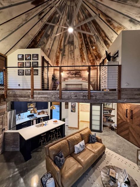 Interior view, loft bedroom with king size bed / kitchen Silo Homes Interior, Grain Bin House Plans, Grain Bin Interior Ideas, Grain Bin Bedroom, Grain Silo House Interiors, Grain Bin Cabin Guest Houses, Grain Bin House Interior, Silo House Interior, Grain Bin Addition To House