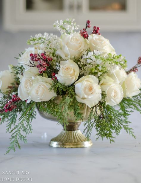 An Easy DIY White Rose and Pine Winter Centerpiece - Sanctuary Home Decor White Gold Floral Arrangements, Beautiful Flower Centerpieces, Half Sphere Floral Centerpiece, Christmas Centerpieces For Table Flowers, Valentines Banquet Centerpieces, Christmas Flower Centerpieces For Table, Pointsetta Arrangements, Winter Floral Arrangements Wedding, Christmas Party Floral Centerpieces