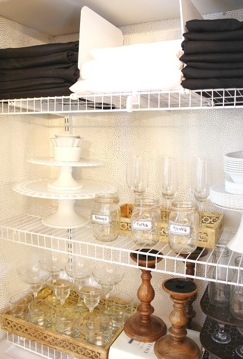 Transform a rarely used coat closet into an entertaining closet. It is the perfect place for storage of cake stands, trays, candle sticks and glassware. Having everything at your fingertips makes entertaining a breeze and there is still room for storing your guests coats! Entertaining Closet Organization, Party Supplies Storage Ideas, Hosting Closet, Entertaining Closet, Party Supply Organization, Coastal Dinnerware, Shower Cleaning Hacks, Closet Organized, Coat Closet