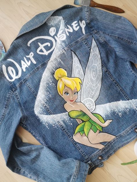 Painted Jacket Denim, Disney Jean Jacket Diy, Hand Painted Jean Jacket, Painted Jeans Disney, Painted Jean Jacket Ideas Disney, Disney Jean Jacket, Painted Disney Jacket, Disney Blue Jean Jacket, Disney Denim Jacket