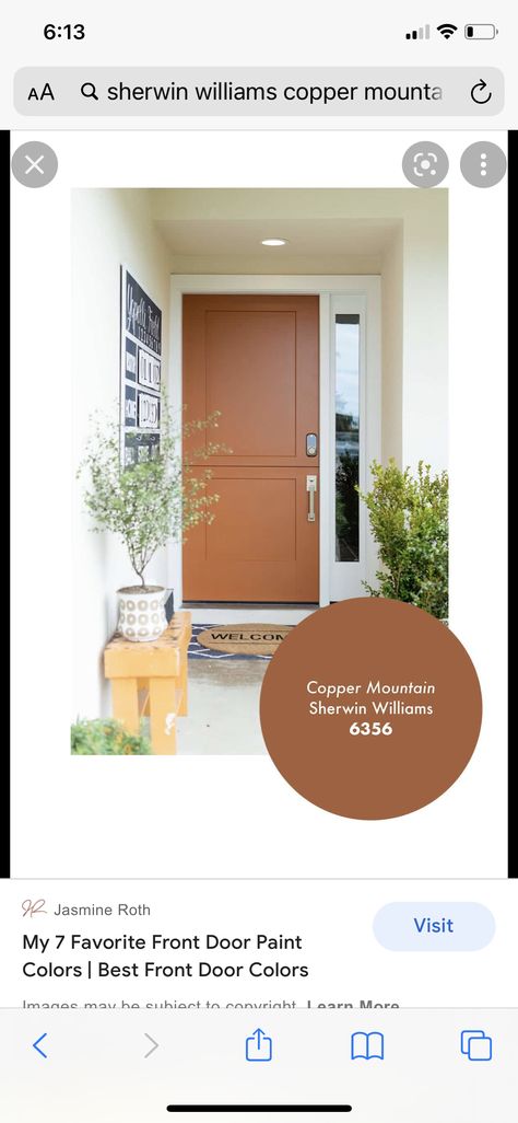 Grey House Orange Door, Copper Color Front Door, Rust Orange Front Door, Cavern Clay Front Door, Earthy Front Door Colors, Terracotta Door Color, Brown House Door Color Ideas, Rust Colored Front Door, Rust Front Door