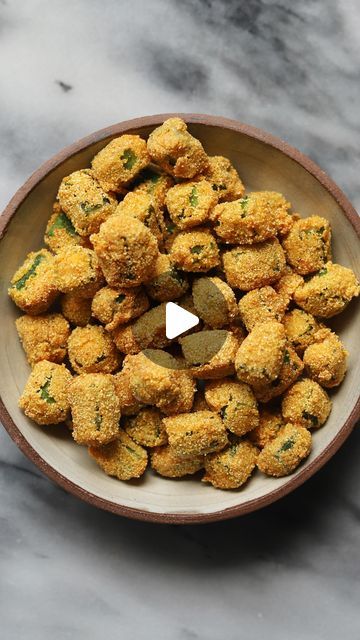 Travelandmunchies on Instagram: "Southern fried okra! And technically Mini Series Episode 1! A 10/10 snack or side dish and so simple. I didn’t use exact measurements when I made this but below I have written rough estimate. Okra is a popular ingredient in Southern cooking and absolutely love this preparation. Try and work in batches when coating to avoid excessive clumping and don’t worry about spots on the okra that don’t get coated. Yes, I believe this should work with frozen okra as well but I am yet to try it. 

Recipe:
- Approximately 20 fresh okra 

Batter 
- 3/4 cup milk 
- 1 egg

Dredge 
- 1 cup all purpose flour
- 1 cup yellow cornmeal
- 2 teaspoons Kosher salt
- 1/2 teaspoon paprika
- 1/2 teaspoon garlic powder
- 1/2 teaspoon onion powder
- 1/4 teaspoon white pepper

To fry and Frozen Okra, Southern Fried Okra, Fresh Okra, Okra Fries, Fried Okra, All Purpose Flour, Southern Cooking, Mini Series, White Pepper