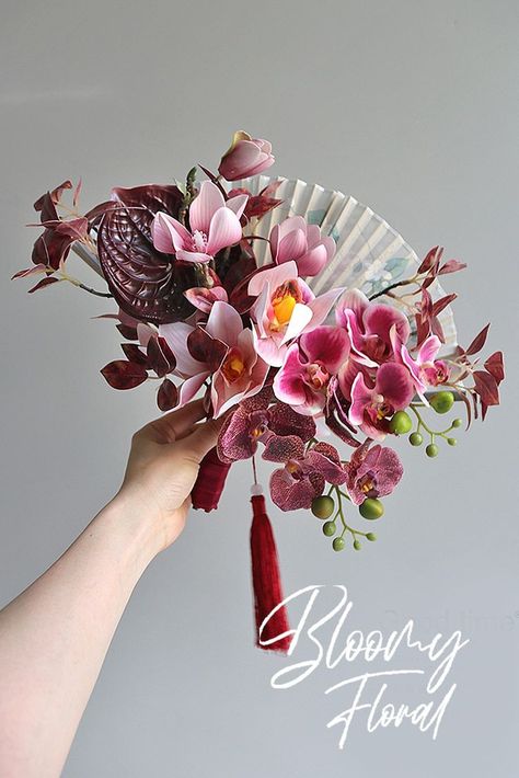 chinese wedding bouquet artificial flower orchid folding fan bouquet chinese traditional bridal bouquet Chinese Folding Fan, Traditional Chinese Wedding, Hand Bouquet, Artificial Flower Bouquet, Folding Fan, Flower Therapy, Chinese Wedding, Deco Floral, Wedding Mood Board