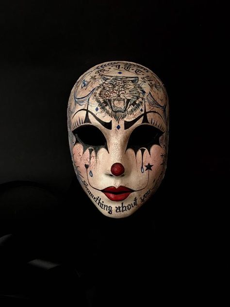 Is it a clown? Is it a mime ? I don’t know... What I do know is that there’s something about her just like her tattoo said, and it will be something about you when you will wear her! ❤️🖤 Hand made paper mache mask, painted with acrylic colors and special finishes. It suits most adult faces and gets Halloween Masks For Women, Tattoo Mask, Mask Project, Costume Department, Jester Mask, Creepy Masks, Paper Mache Mask, Masque Halloween, Mascaras Halloween