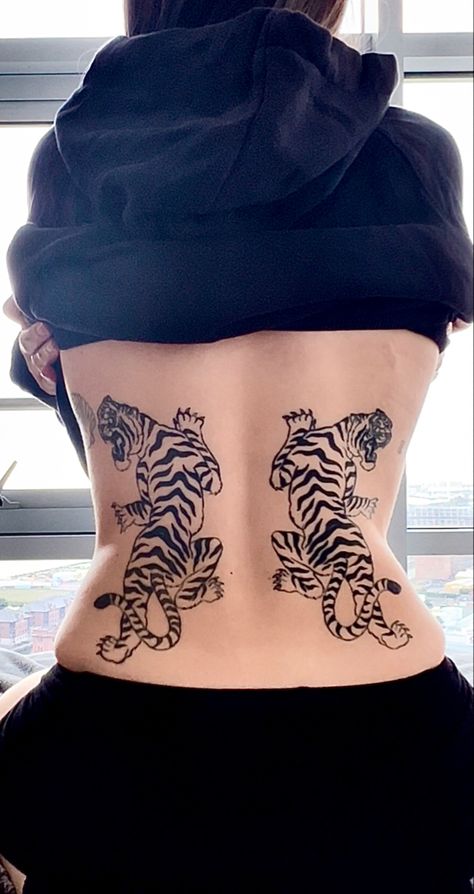 Back tiger tattoo Lower Back Tiger Tattoo, Tiger Back Tattoo Woman, Back Tattoo Tiger, Back Tiger Tattoo, Tiger Tattoo Back, Tiger Back Tattoo, Tattoo Japan, Big Cat Tattoo, Card Tattoo Designs