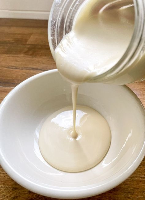 This homemade sweetened condensed milk recipe is a game changer - there is no cooking involved and it's sweetened only with maple syrup! With only three simple ingredients - powdered non-fat milk, maple syrup, and butter, it's perfect for adding a touch of sweetness to any dessert recipe or simply enjoying by itself in drinks. Get ready to be blown away by this ridiculously easy recipe! Condensed Milk Recipe, Homemade Sweetened Condensed Milk, Coconut Milk Uses, Condensed Milk Recipes, Dairy Free Alternatives, No Cook, Cooking Homemade, Cranberry Recipes, No Cooking