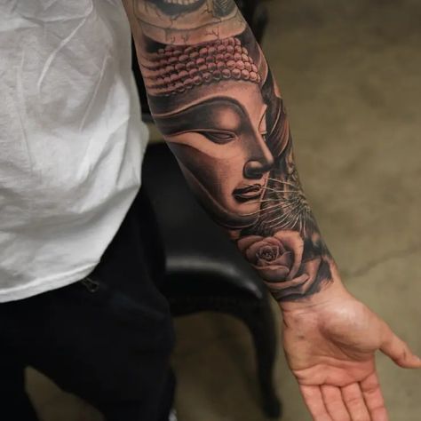 Black & Grey Realism Buddha Half Sleeve Tattoo Idea & Design on Lower Arm Buddha Half Sleeve Tattoo Done By Black And Grey Half Sleeve Tattoo, Buddha Half Sleeve Tattoo, Realism Tattoo Ideas, Half Sleeve Tattoos, Realism Tattoo, Rib Tattoo, Half Sleeve Tattoo, Idea Design, Sleeve Tattoo