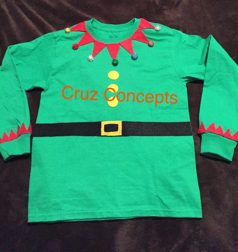 Diy elf tshirt green red poms belt Elf Outfit Kids, Diy Elf Shirt, Dress Like An Elf Day At School, Elf Day At School Outfit, Diy Elf Costume For Kids, Kids Elf Outfit, Christmas Elf Costume Diy, Kids Elf Costume, Preschool Elves